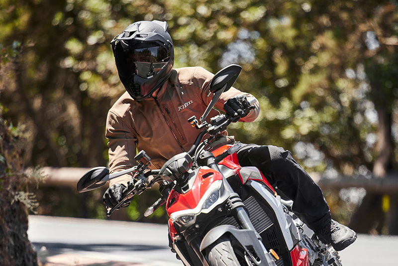 Guy wearing Klim Marrakesh jacket riding Ducati